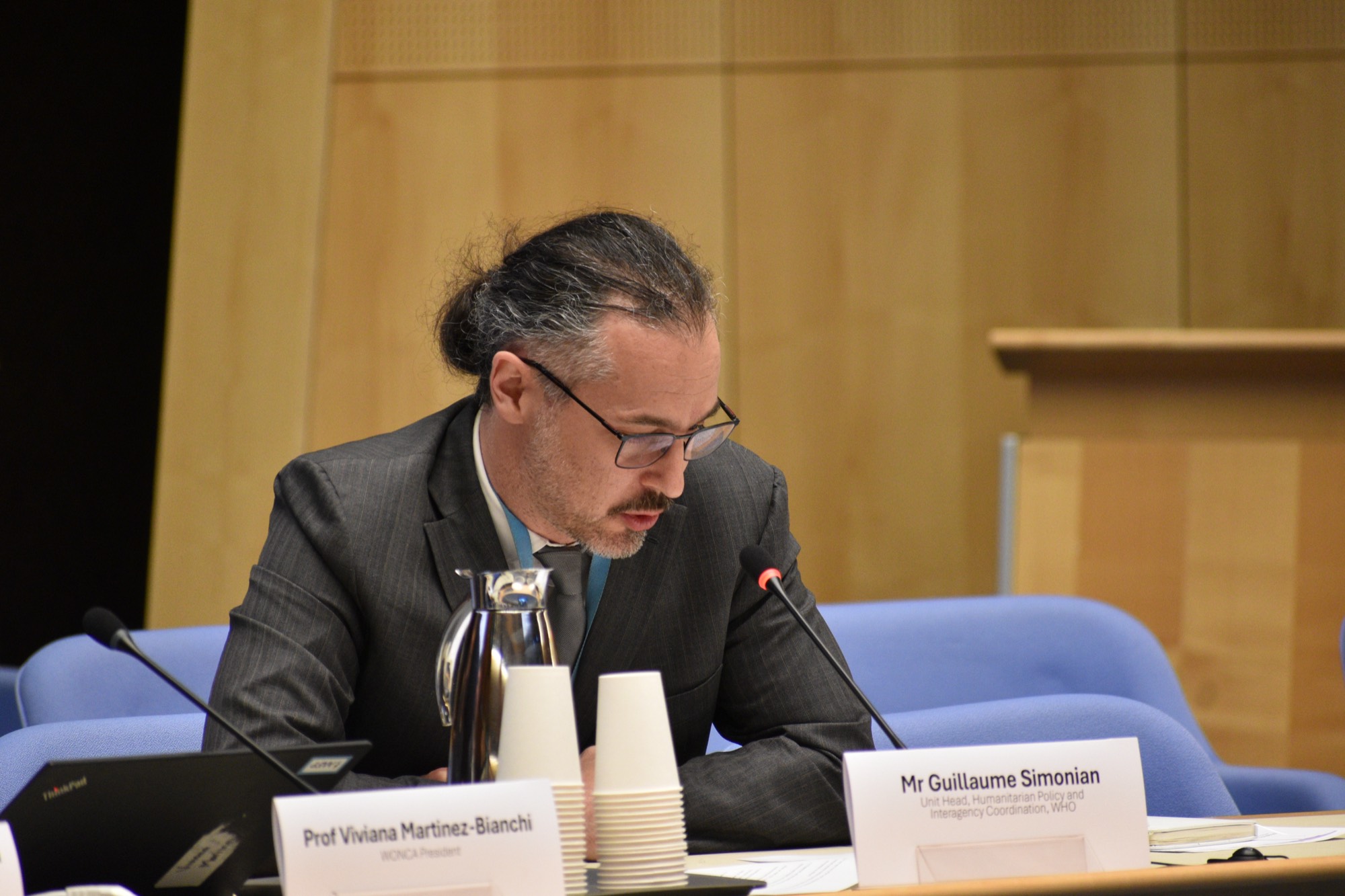 Speakers and participants at the Bridging Health and Peace side event